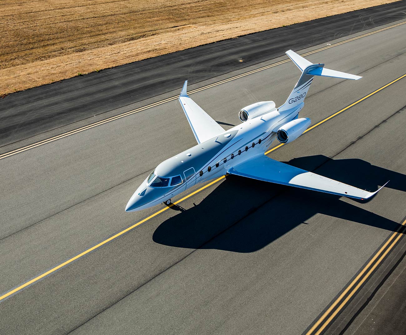 G280 parked on runway