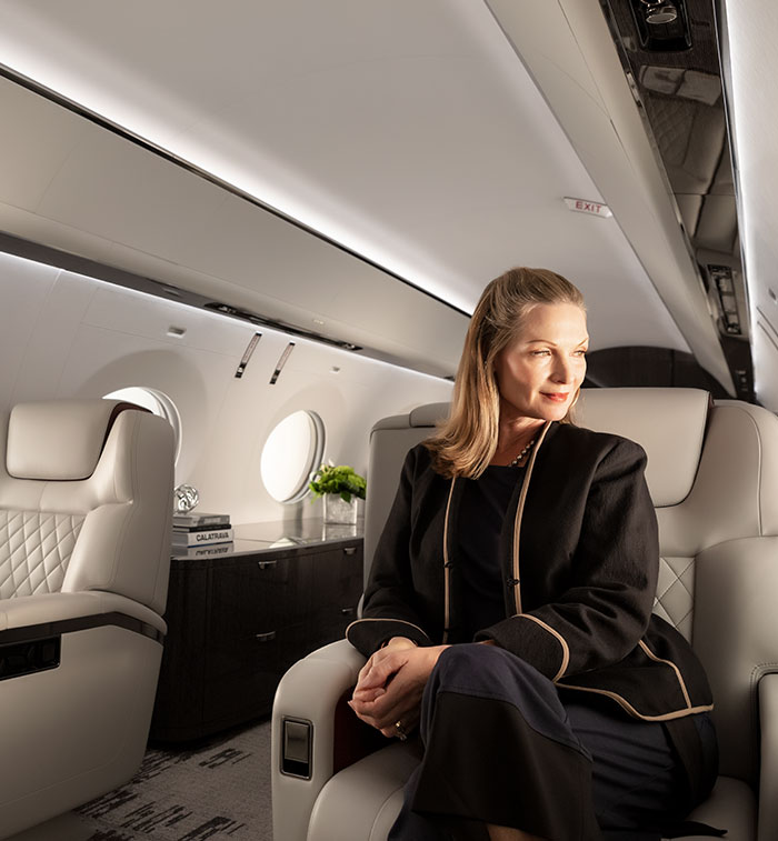 Woman seated inside aircraft