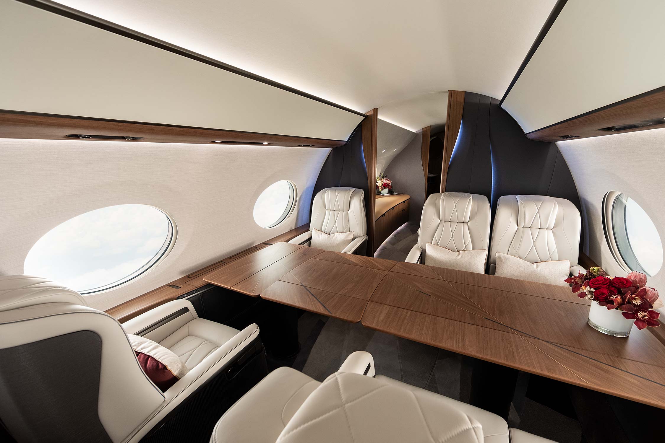 Conference table with six leather seats in a private airplane