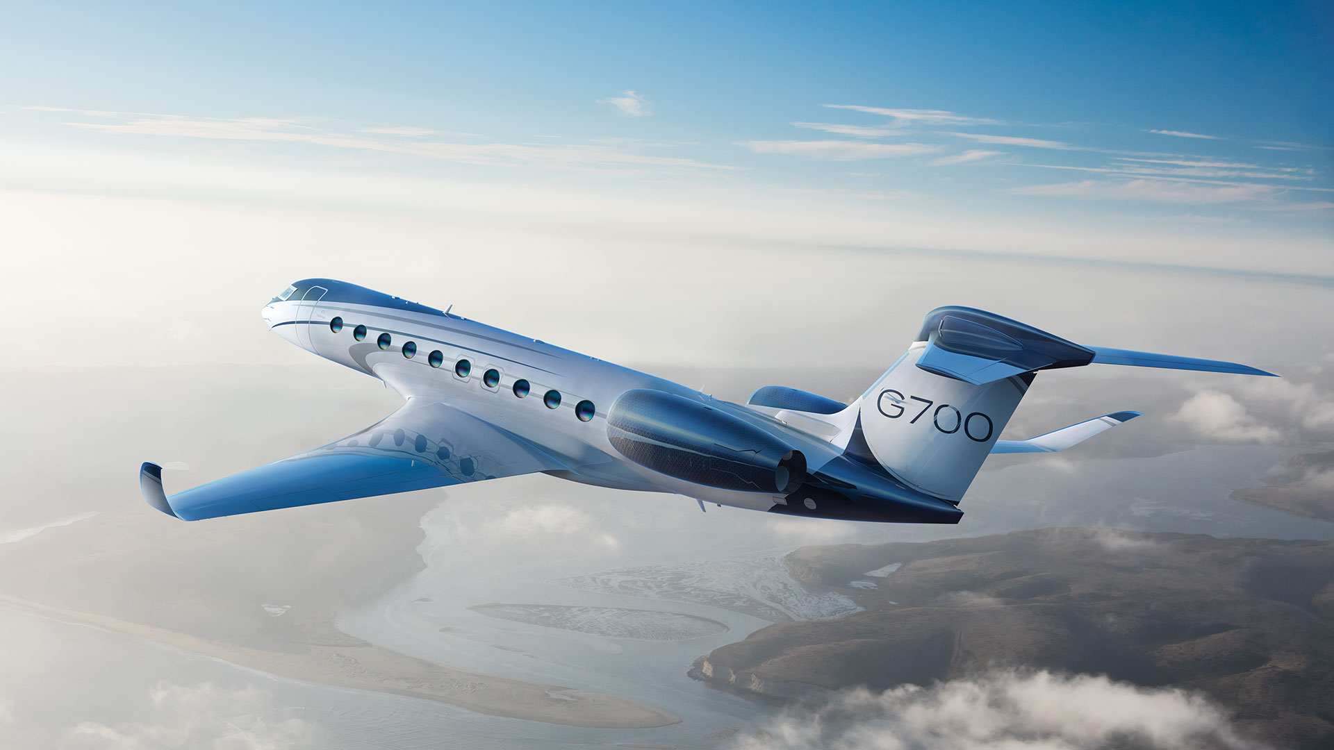 Gulfstream G700 flying through clouds